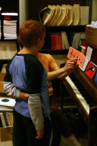 child playing piano